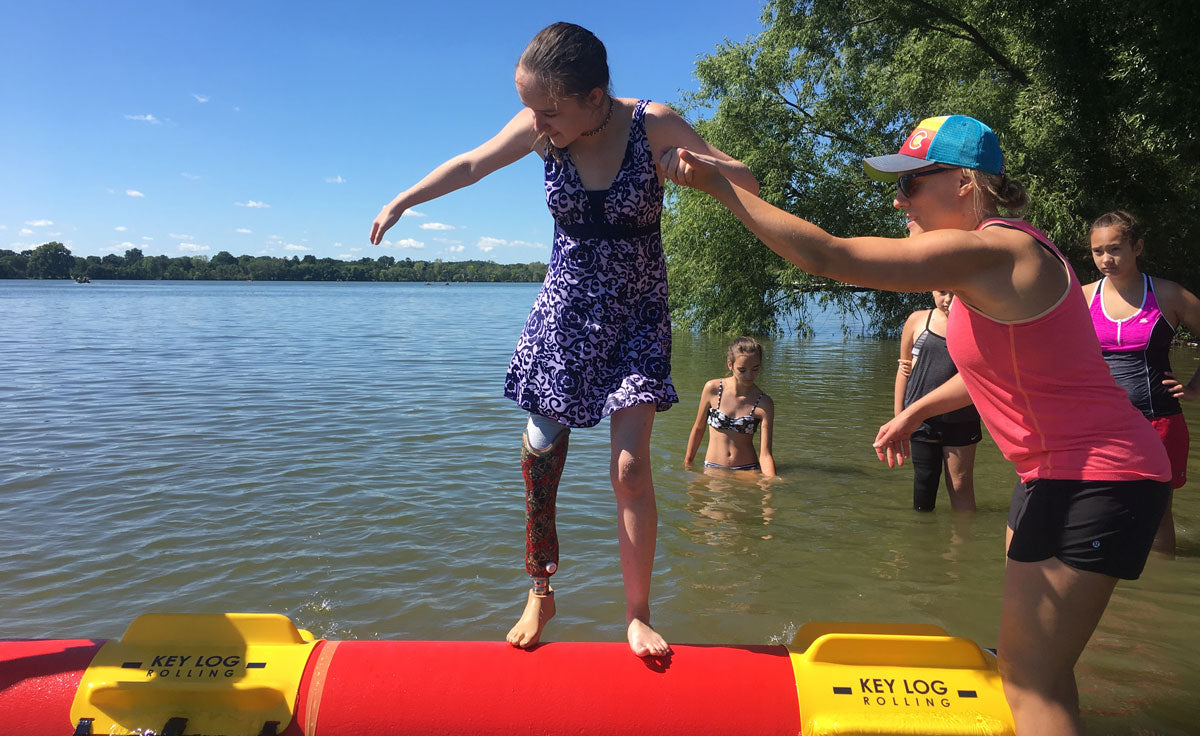 Kids Gain Confidence Through Log Rolling at Therapeutic Recreation Camp